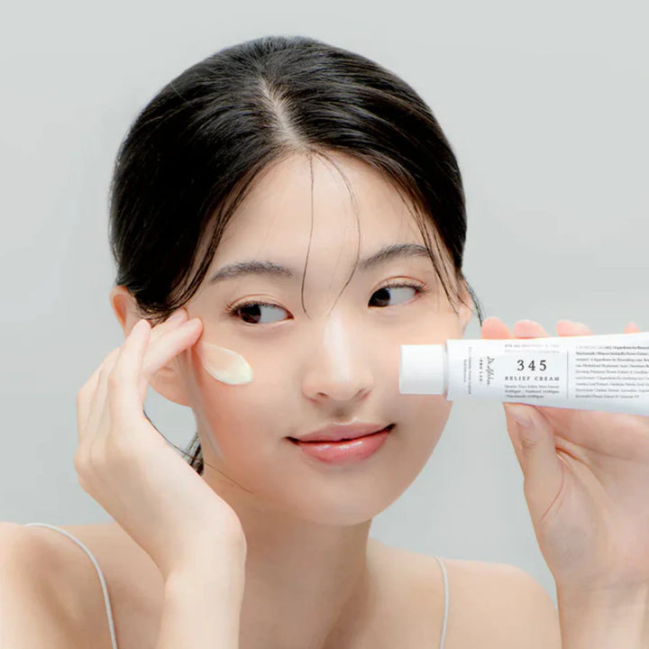 Dr. Althea 345 Relief Cream – Hydrating & Calming Korean Skincare with model holding the cream